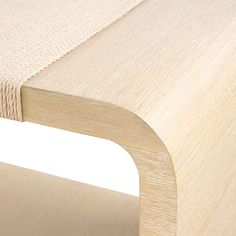 a close up view of a table made out of plywood and roped together