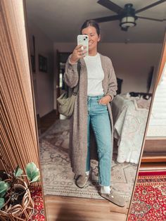 Girl standing in front of mirror taking selfie of outfit— long cardigan, jeans, birkenstock boston clogs. Hair is pinned in a claw clip. Fall Duster Outfit, Grey Duster Cardigan Outfit, Long Cardigan Leggings Outfit, Plus Size Clogs Outfit, Winter Birkenstock Clog Outfit, Birkenstock Clogs Outfit Plus Size, Socks And Clogs Outfit, Rainy Teacher Outfit, Teacher Tennis Shoes Outfit