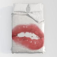 a bed with red lips painted on it