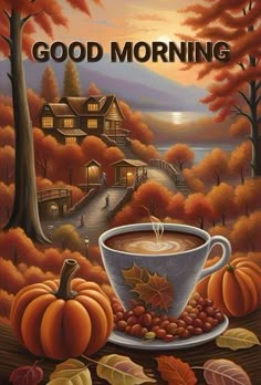 a cup of coffee sitting on top of a table next to pumpkins and leaves