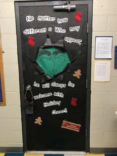 a door decorated with an image of the grin's hat and other things on it