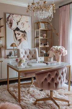 a desk with a pink chair and chandelier