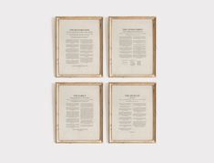 four framed books with text on them