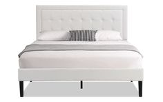 a bed with a white headboard and two pillows on it's sides, against a white background