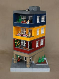 a lego model of a multi - story building