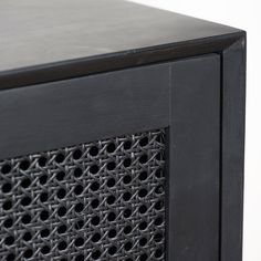 a close up view of the inside of a black computer case with holes in it