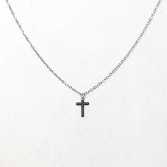 Stainless Steel Miniature Dangle Religious Cross Necklace Give Your Spirit Extra Lift With This Mini Cross Pendant Necklace. A Timeless Symbol Of Faith, This Diamond Cross Pendant Necklace Is A Versatile Choice That Can Be Worn With A Variety Of Looks. Chain Measure 8.5" With A 2" Ext Cross Measures 1 Cm Tall X 1 Cm Wide Silvercross #Crossnecklace #Jesus #Communion #Confirmation #Baptism #Christining |Cross Pendant For Women | Diamond Cz Cross Necklace | Dainty Cross Necklace Wedding | Religious Dainty Cross Necklace, Music Necklace, Slider Necklace, Christian Necklace, Long Statement Necklace, Timeless Symbol, Mini Cross, Religious Cross, Pendant For Women