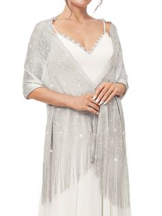 PRICES MAY VARY. Silver shawl is made of polyester. The combination of sparkling metal threads and delicate fringe is very eye-catching. 1920s shawl wrap approx size:200*70cm/78.7*27.6IN (including tassels) and comes with a free crystal buckle. Light weight and easy to carry. Wedding accessories for brides come in many colors. You can choose the right color according to your preference or clothing style. Occasions:There are many ways to wear shawls. It is the perfect match for the dress. Fashion Bridal Capelet, Wedding Scarf, Shrug For Dresses, Silver Silk, Sparkle Wedding, Sleeveless Gown, Gold Silk, Women Shawl, Brides And Bridesmaids