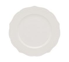 an empty white plate on a white background