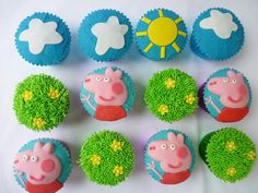 cupcakes with peppa the pig decorations on them