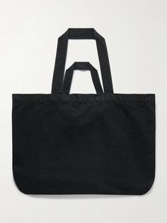 Kaptain Sunshine's tote bag is made from durable black canvas that's lightly faded for a vintage look. It has two sets of straps so you can carry it in hand or on your shoulder and plenty of space inside for your water bottle, over-ear headphones and a hoodie. Tote Bag For Men, Ear Headphones, Black Canvas, Black Tote Bag, Canvas Tote Bag, Mr Porter, Vintage Look, Over Ear Headphones, Canvas Tote