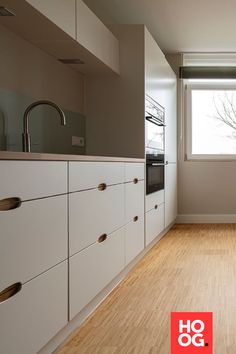 the kitchen is clean and ready for us to use in its new owner's home