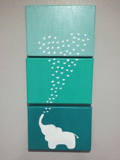 two canvases with an elephant and hearts on them, one is painted green and the other is white