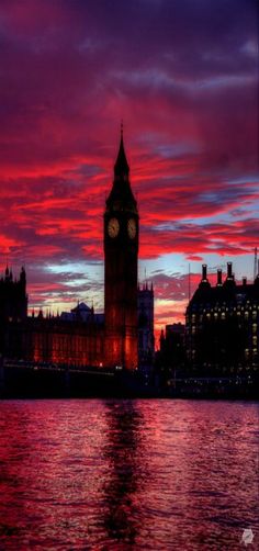 the big ben clock tower towering over the city of london at sunset or sunrise time