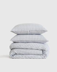 three pillows stacked on top of each other