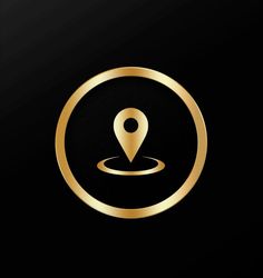 a black and gold logo with a pin in it's center, on a dark background