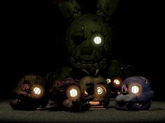 four stuffed animals with glowing eyes and the words, what is the end?