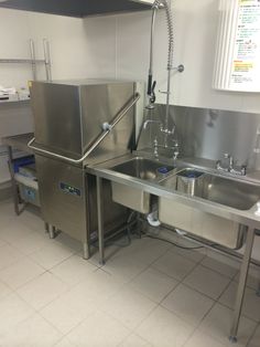 two stainless steel sinks in a commercial kitchen