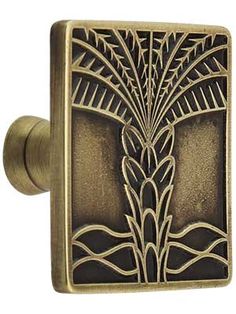 an antique style door handle with a decorative design