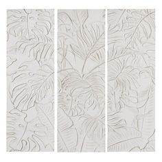 three panels with leaves drawn on them in different sizes and colors, one is white