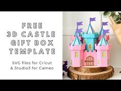 a pink and blue castle with purple flags on it is next to a tree stump that says free 3d castle gift box template