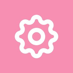 a pink background with a white flower on the center and an orange circle in the middle