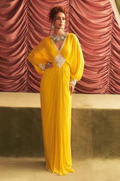 Yellow draped dress with mirror, bead, cutdana embroidery in geometric pattern. - Aza Fashions Georgette Dress Western, Sangeet Look, Dress Georgette, Embroidery Mirror, Vacuum Storage, Ready To Wear Saree, Indian Wedding Wear, Georgette Dress, Sleeves Blouse