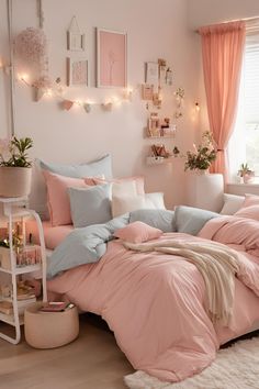 a bedroom with pink and blue bedding in the corner, lights strung from the ceiling