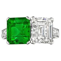 Double your pleasure with this extraordinary natural Colombian emerald and diamond two-stone handmade platinum ring. With a 2.30 carat luscious emerald cut emerald and a 2.82 carat emerald cut white diamond, designed as a perfect marriage, this rare two-stone ring will have you seeing double. Emerald AGL certification #1112154. Diamond GIA certification #2211894728. E color. VVS1 clarity. Designed by Steven Fox Jewelry. Size 5 3/4. Can be custom sized. Two Stone Ring, Columbian Emeralds, Fox Jewelry, Vintage Style Rings, Colombian Emeralds, Perfect Marriage, Jewelry Fashion Trends, Expensive Jewelry, Platinum Ring