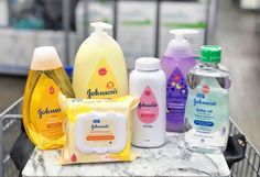 a shopping cart filled with different types of hand sanitizers