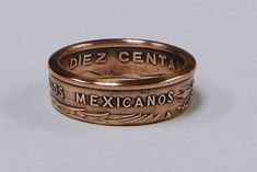 All items are handcfafred by me .COIN RING made from Mexican 10 centavos coin sizes 4 -10 This ring is sealed with Protectaclear to prevent any skin discoloration or allergic reaction to the ring ProtectaClear is highly resistant to salts and chlorines.ProtectaClear is tough and durable - scratch resistant Coin Ring, Skin Discoloration, Allergic Reaction, Ring Ring, Band Rings, Rings For Men, Jewelry Rings, Coin, Ring Size