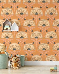 an orange and beige wallpaper with fan design on the walls, next to a teddy bear