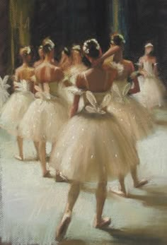 several ballerinas in white tutus are dancing together