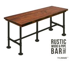 the rustic wood and pipe bar table is made from metal pipes, with wheels on each side