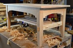 a work bench being built in a wood shop