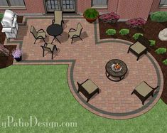 an aerial view of a patio and fire pit