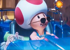 a cartoon character riding in a car with a mushroom hat on his head and sunglasses