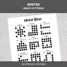 a printable winter bingo game with black dots