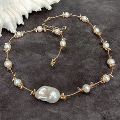 Gems Info: cultured pearl, white potato pearl, white baroque pearl. Diameter:  7-8mm(potato pearl), 14x22mm(baroque pearl) Length: 18.5" / 45.72cm weight: 22 gram Clasp:  18 K GP clasp Packing: Silk Pouch On Sep 9, 2023 at 20:16:31 PDT, seller added the following information: Bead Jewelry Ideas, Pearl Baroque, Stone Bead Jewelry, Pearl Clasp, Pearl Jewelry Design, Pearl Choker Necklace, Pearl Choker