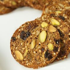 cookies with nuts and raisins on a white plate