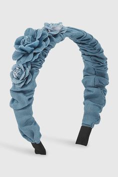 a blue headband with flowers on it