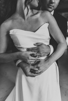 black and white photograph of a couple embracing each other