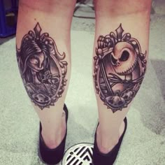 two people with tattoos on their legs and one has a skull in the middle of them