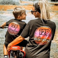 90s Finish Line Shirt, Motocross, Checkered, Personalized Tee,Racing Shirt, Moto Mom, Supercross Tee, Dirt Track, Circle Track, Kart Racing,Racing Family, Holeshot, Braap, Custom  Front- Checkered circle with number Back- Custom name & Number with Holeshot brand logo and 90s checkered design  ⚡️please keep in mind this is a ombré design and I can not guarantee the colors qty.  example there may be more purple tones or more pink.  Red White & Blue may have no white on front depending on design. ? Racing Shirts Dirt Track, Dirt Track Racing Shirts, Dirt Bike Shirts, Motocross Shirts, Racing Apparel, Moto Mom, Race Day Outfits, Races Outfit, Kart Racing