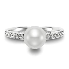 a white pearl and diamond ring