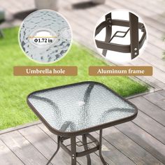 an umbrella hole and aluminum frame table in the yard with green grass behind it on a wooden deck