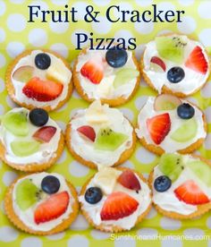 fruit and cracker pizzas are arranged on a plate