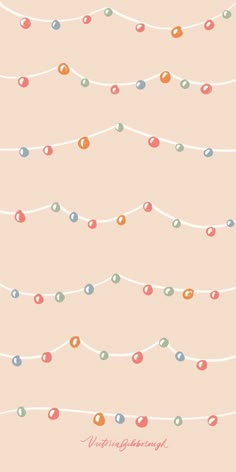 a string of christmas lights on a pink background