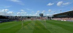 a large soccer field with many people on it