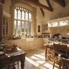 a kitchen filled with lots of counter top space next to a dining room table and chairs